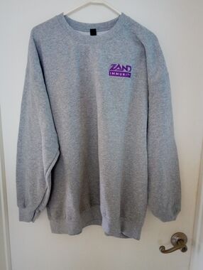 Unisex Gildan Light Gray Crewneck Sweatshirt with Purple ZAND Immunity Logo
